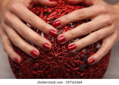 Beautiful woman's nails with beautiful christmas manicure studio - Shutterstock ID 337161464