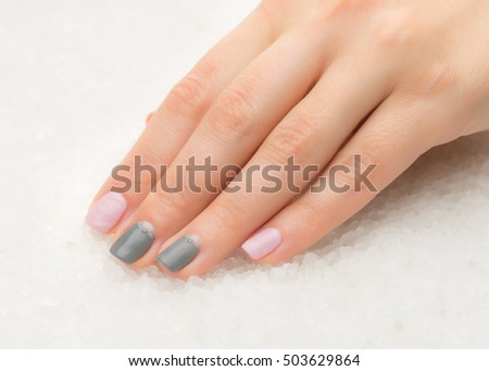 Beautiful woman's nails with nice stylish manicure