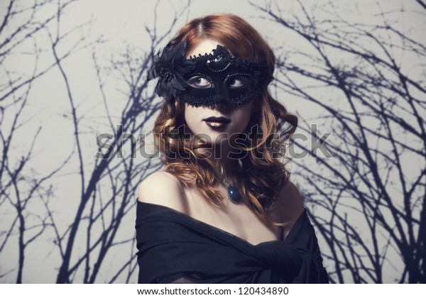 masked girls in the forest
