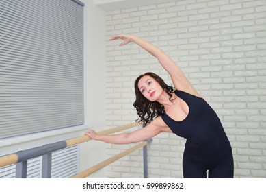 Beautiful women dancer practicing ballet at dancing studio