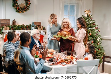 Beautiful Women Holding Christmas Turkey For Holiday Dinner