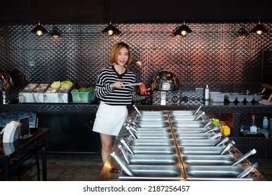 A Beautiful Women In Korean Bbq Restaurant