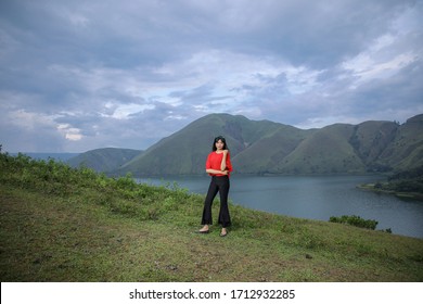 Beautiful Women Pose On The Mount Holbung Lake Toba