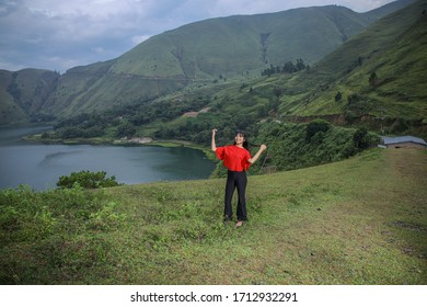 Beautiful Women Pose On The Mount Holbung Lake Toba