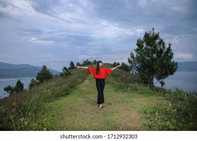 Beautiful Women Pose On The Mount Holbung Lake Toba