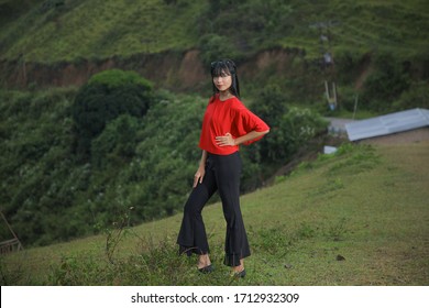 Beautiful Women Pose On The Mount Holbung Lake Toba