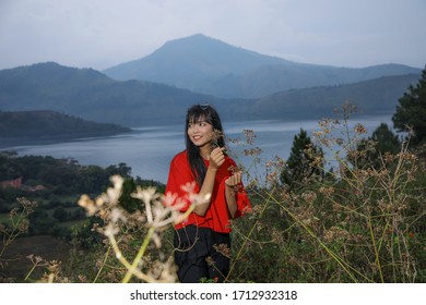 Beautiful Women Pose On The Mount Holbung Lake Toba