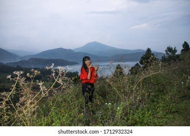 Beautiful Women Pose On The Mount Holbung Lake Toba