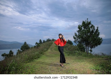 Beautiful Women Pose On The Mount Holbung Lake Toba