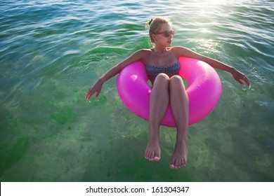 Beautiful women relax in floating On Water