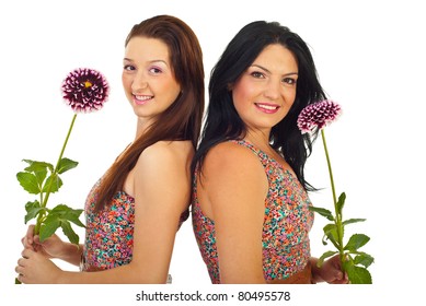 Beautiful Women Wearing Same Dress And Holding Flowers Isolated On White Background