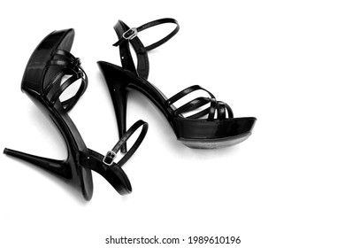 Beautiful Womens Shiny Patent Black Stiletto Sandals On A White Background 