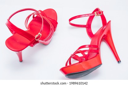 Beautiful Womens Shiny Patent Red Stiletto Sandals On A White Background 