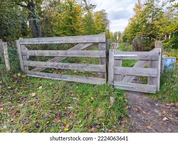 Beautiful wood cattle grid fence that serves as a perimeter periphery in a forest in Heemstede, the Netherlands - Shutterstock ID 2224063641