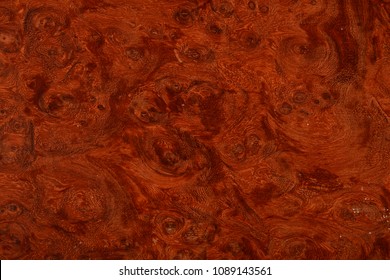 A beautiful wood grain effect with natural burl.  Use as a tileable backdrop pattern map.