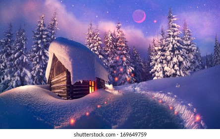 Beautiful wooden house as Santa Claus, with glowing window is located at the beginning of the lifting of the alpine heights. Climbers spend the night here and in morning go to the top to meet  new day - Powered by Shutterstock