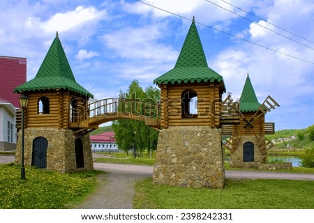 beautiful wooden staircase between two towers on the playground at the Krasnousolsky resort of Bashkortostan