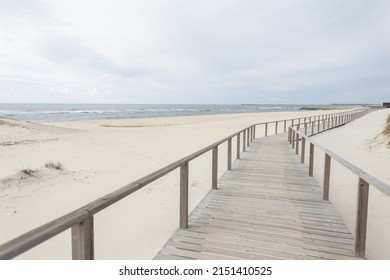 Beautiful Wooden Walkway on the Beach along the Ocean