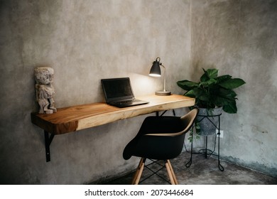 Beautiful Workspace - Online Remote Work From Home Concept. A Wooden Table With Computer Laptop, Smartphone, Coffee Cup Beside The Window Balcony With Sun Light Shine Through The Curtain. No People.