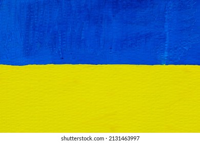 Beautiful Yellow And Blue Painted Ukrainian Flag During A Peaceful Demonstration Against War, Putin And Russia In Support Of Ukraine, Background, Copy Space. Glory To Ukraine