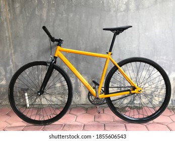 A Beautiful Yellow New Bycicle.