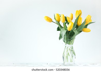 beautiful yellow tulips on wooden background, father, mother, women, valentine's day concept beautiful yellow tulips on wooden background, father, mother, women, valentine's day concept
