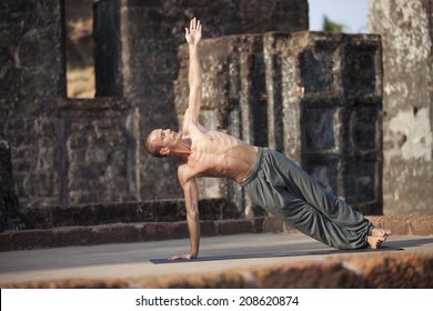 Beautiful yoga position at the ruins of India.