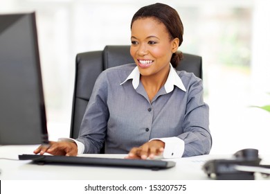 Beautiful Young African American Businesswoman Working On Computer