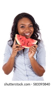 Beautiful Young African American Woman With Slice Of Watermelon