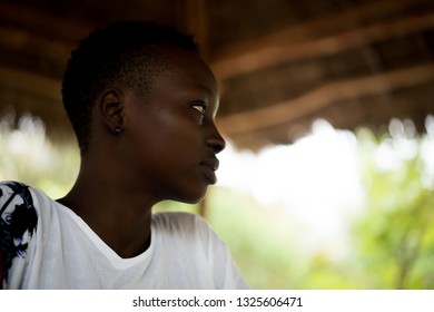 Beautiful young African girl outdoors