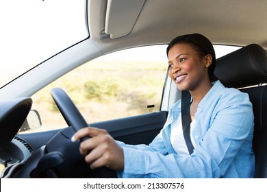 Beautiful Young African Woman Driving A Car