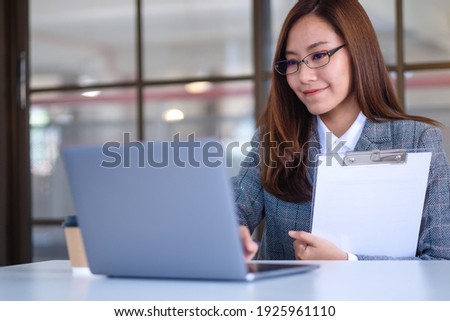 Similar – Foto Bild Frau mit Laptop bei der Arbeit zu Hause