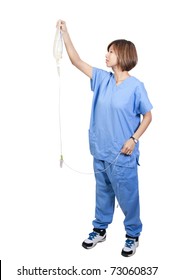 A Beautiful Young Asian Female Doctor Holding An IV Bag