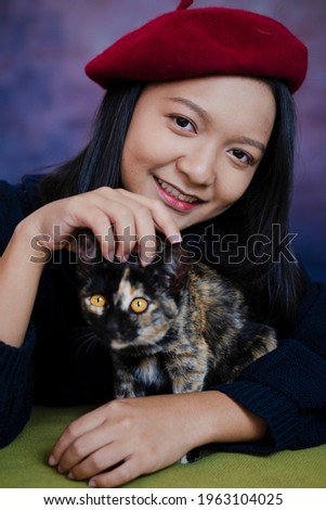 Similar – Image, Stock Photo Cat in hat Domestic cat