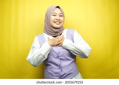 Beautiful Young Asian Muslim Woman Smiling Surprised And Cheerful, With  Hands Holding Chest, Excited, Not Expecting, Looking At Camera Isolated On Yellow Background