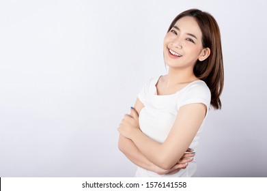 Beautiful Young Asian Stand And Pose With Big Smile Happy Beaming Face In White Background.