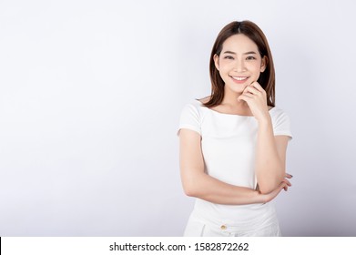 Beautiful Young Asian Stand And Pose With Big Smile Happy Beaming Face In White Background.