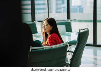 Beautiful Young Asian Thai Businesswoman In Red Shirt In Conference Room Working With Business People.