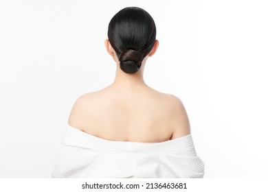 Beautiful young asian woman back view with clean fresh skin on white background, Face care, Facial treatment, Cosmetology, beauty and spa, Asian women portrait.