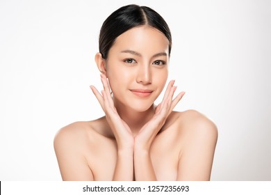 Beautiful Young asian Woman with Clean Fresh Skin look. Girl beauty face care. Facial treatment. Cosmetology, beauty and spa.