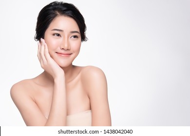 Beautiful Young Asian Woman with Clean Fresh Skin touch own face, Facial treatment, Cosmetology, beauty and spa,