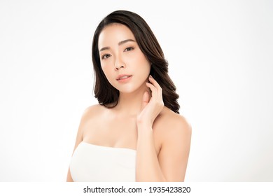 Beautiful young asian woman with clean fresh skin on white background, Face care, Facial treatment, Cosmetology, beauty and spa, Asian women portrait. - Shutterstock ID 1935423820