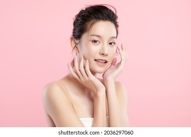 Beautiful young asian woman with clean fresh skin on pink background, Face care, Facial treatment, Cosmetology, beauty and spa, Asian women portrait. - Shutterstock ID 2036297060