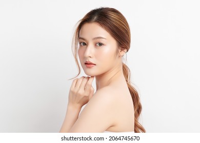 Beautiful young asian woman with clean fresh skin on white background, Face care, Facial treatment, Cosmetology, beauty and spa, Asian women portrait. - Shutterstock ID 2064745670