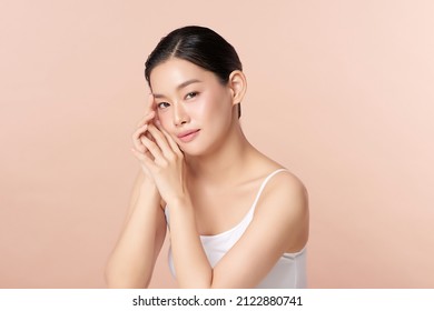 Beautiful Young Asian Woman With Clean Fresh Skin On Beige Background, Face Care, Facial Treatment, Cosmetology, Beauty And Spa, Asian Women Portrait.