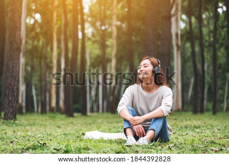 Similar – Image, Stock Photo Girl enjoying the fresh air in green forest.