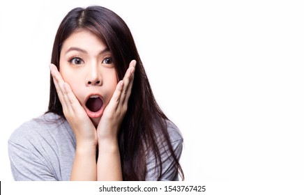 Beautiful young asian woman get surprised, shocked when product on sale promotion. Attractive beautiful girl open mouth, put hand on cheek. Pretty lady get unbelievable, excited, impressed. copy space
