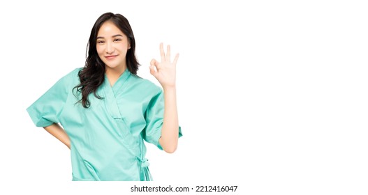 Beautiful Young Asian Woman Give Okay Sign Happy Patient Wear Patient Hospital Gown Standing Over Isolated On White Background Copy Space Health Care And Medical And Insurance Concept