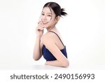 Beautiful young Asian woman with K beauty style makeup and perfect skin on isolated white background. Facial and skin care concept for commercial advertising.