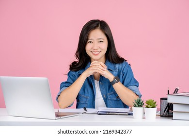 Beautiful Young Asian Woman Smiling And Sit Work At White Office Desk. Achievement Career Concept.